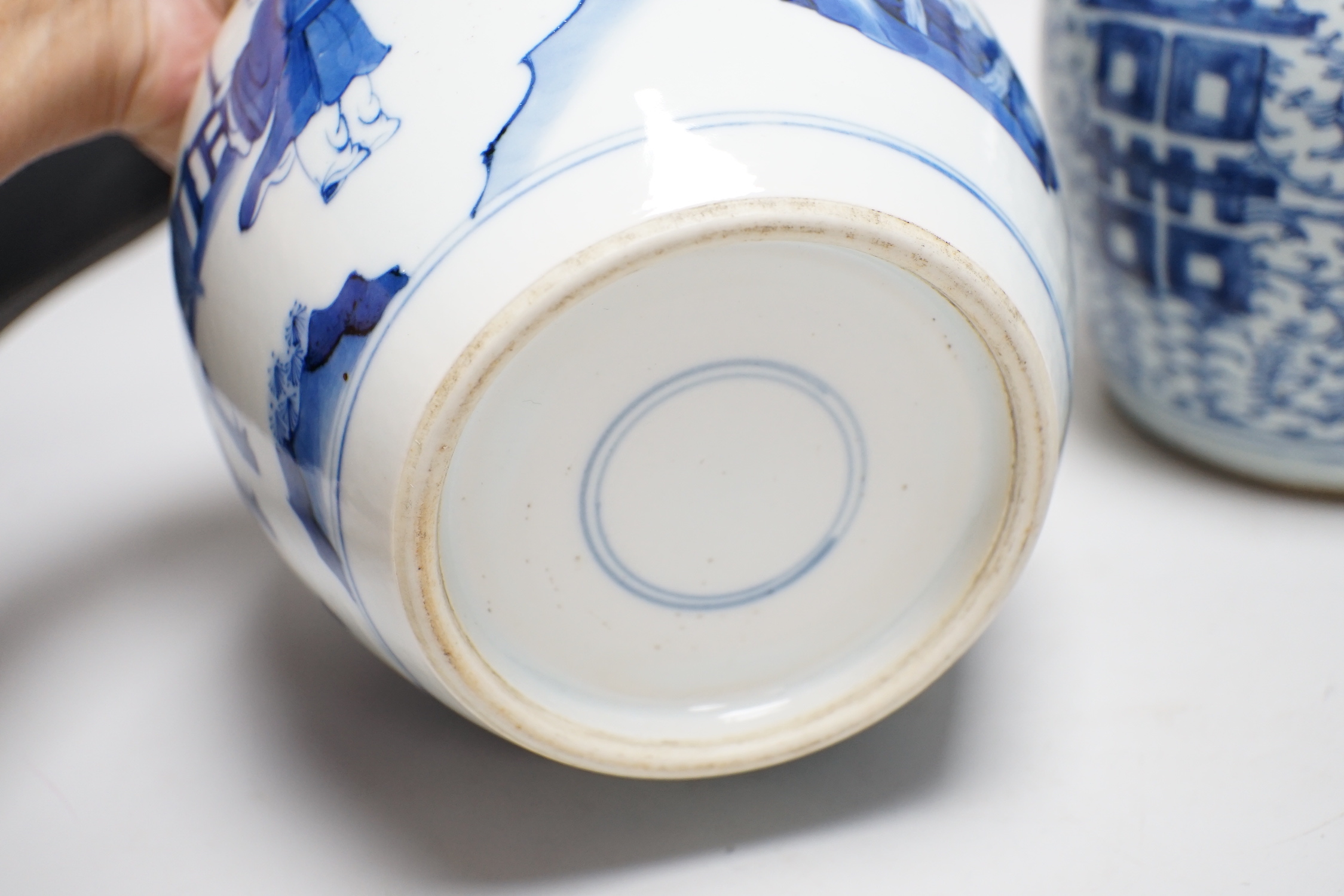 Two Chinese blue and white jars and a similar tea caddy